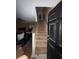 View of the staircase leading to the upper level of the home at 4752 Browns Mill Ferry Rd, Lithonia, GA 30038