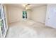 Spacious bedroom with neutral carpet, trim and large windows, offering great natural light at 5346 Light Cir, Norcross, GA 30071