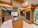 Well-equipped kitchen with stainless steel appliances, granite countertops, and custom cabinets at 5346 Light Cir, Norcross, GA 30071