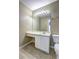 Bathroom features vanity, ample lighting, and convenient storage, plus toilet with neutral decor at 10900 Wittenridge Dr # L6, Alpharetta, GA 30022