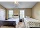 Bedroom featuring two twin beds, carpet, with good natural light and room for personalization at 10900 Wittenridge Dr # L6, Alpharetta, GA 30022
