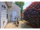 Side patio featuring storage shed and exercise equipment at 10900 Wittenridge Dr # L6, Alpharetta, GA 30022