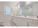 Bathroom with double vanity, ample storage, and a sleek, glass-enclosed shower at 1149 Ansel Nw Ln, Atlanta, GA 30318