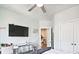 Contemporary bedroom featuring TV, mirrored desk, and an open doorway to another room at 1149 Ansel Nw Ln, Atlanta, GA 30318