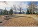 Well-maintained community green space with mature trees, walkways, and picnic tables for residents at 1149 Ansel Nw Ln, Atlanta, GA 30318
