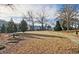 Picturesque community lawn with mature trees, walking paths, and tidy landscaping at 1149 Ansel Nw Ln, Atlanta, GA 30318