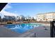 Resort-style pool in a luxurious residential community on a bright, sunny day at 1149 Ansel Nw Ln, Atlanta, GA 30318
