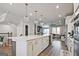 This expansive kitchen island features a sink and overlooks the Gathering room at 1149 Ansel Nw Ln, Atlanta, GA 30318