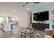 Open-concept living room with a modern kitchen, sleek furnishings, and an entertainment center at 1149 Ansel Nw Ln, Atlanta, GA 30318