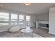Bright living room showcasing hardwood floors, with lots of natural light and walkout balcony access at 1149 Ansel Nw Ln, Atlanta, GA 30318