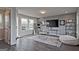 This living room boasts hardwood floors, large windows, tv and tasteful decorations at 1149 Ansel Nw Ln, Atlanta, GA 30318