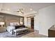 Comfortable main bedroom boasts a luxurious bed, stylish decor, and a barn door leading to a walk-in closet at 1149 Ansel Nw Ln, Atlanta, GA 30318