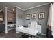 A modern home office is set against a neutral color palette and features bright white furniture at 1149 Ansel Nw Ln, Atlanta, GA 30318