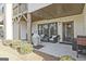 Cozy outdoor patio area with seating, a grill, and access to the backyard at 1149 Ansel Nw Ln, Atlanta, GA 30318