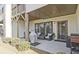 Relaxing outdoor patio with grill, seating, and a view to an open yard area at 1149 Ansel Nw Ln, Atlanta, GA 30318