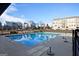 Community pool featuring crystal clear water, modern lounge furniture and meticulously kept grounds at 1149 Ansel Nw Ln, Atlanta, GA 30318