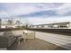 This rooftop deck offers outdoor seating with views of the surrounding neighborhood at 1149 Ansel Nw Ln, Atlanta, GA 30318