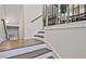 Staircase featuring modern black railings and beautiful wooden steps at 1149 Ansel Nw Ln, Atlanta, GA 30318