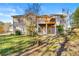 Exterior view of home with two-level deck, showcasing outdoor living at 120 Aspen Forest Dr, Covington, GA 30016