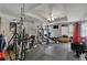 Bright and spacious gym with a ceiling fan and a large variety of equipment at 3735 Duckcove Way, Cumming, GA 30041