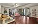 Bright living room with hardwood floors and lots of natural light at 3735 Duckcove Way, Cumming, GA 30041
