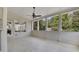 Inviting sunroom with tiled flooring, ample natural light, and a ceiling fan at 3735 Duckcove Way, Cumming, GA 30041