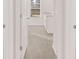 Bathroom featuring tile floor, granite vanity, and a view through the doorway at 5430 Flat Rock Pt, Stonecrest, GA 30038