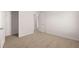 Bedroom with a view of a closet featuring wire shelving at 5430 Flat Rock Pt, Stonecrest, GA 30038