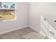 Laundry room with a window and tile floors at 5430 Flat Rock Pt, Stonecrest, GA 30038