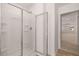 Bathroom featuring glass enclosed shower at 5430 Flat Rock Pt, Stonecrest, GA 30038