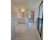 Bright bathroom with marble tile floors, a dual vanity and glass enclosed shower at 1107 Kingston Hill Dr, Loganville, GA 30052