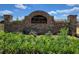 Attractive brick sign for 'The Estates at Brushy Fork' surrounded by lush greenery at 1107 Kingston Hill Dr, Loganville, GA 30052