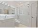 Bright bathroom with a modern sink, sleek toilet, and glass-enclosed shower at 560 Dutch Vly # 2313, Atlanta, GA 30324