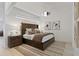 Cozy main bedroom with a king bed, patterned rug, and soft lighting at 560 Dutch Vly # 2313, Atlanta, GA 30324