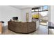 Bright living room showcasing large windows, open floor plan, and modern urban design elements at 89 Mangum St # 210, Atlanta, GA 30313