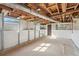 Spacious unfinished basement with large windows offers the potential for versatile use and customization at 264 Rockin Hill Dr, Marietta, GA 30060