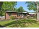 Attractive brick home with fresh landscaping, vibrant green lawn and a well maintained facade at 264 Rockin Hill Dr, Marietta, GA 30060