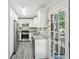 Modern kitchen showcasing stainless appliances, granite counters, and direct access to outdoor space at 264 Rockin Hill Dr, Marietta, GA 30060