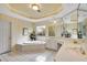 Bright bathroom with a soaking tub, dual sinks, and a vanity area at 350 Declaire Ne Way, Marietta, GA 30067