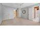 Bedroom showcasing natural lighting, double closets, ceiling fan, and neutral carpet at 350 Declaire Ne Way, Marietta, GA 30067