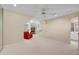 Large bonus room with comfortable seating, a TV, and convenient access to an attached bathroom at 350 Declaire Ne Way, Marietta, GA 30067