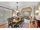 Dining area featuring hardwood floors, stylish furnishings, and bright, natural light at 350 Declaire Ne Way, Marietta, GA 30067