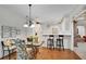 Charming breakfast nook features natural light, a glass table, and bar seating at 350 Declaire Ne Way, Marietta, GA 30067