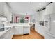 Bright kitchen featuring white cabinets, modern appliances, and ample counter space at 350 Declaire Ne Way, Marietta, GA 30067