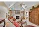 Vaulted ceilings, a fireplace, and abundant natural light highlight this living room at 350 Declaire Ne Way, Marietta, GA 30067