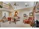 Inviting living room with vaulted ceiling, fireplace, and an open floor plan at 350 Declaire Ne Way, Marietta, GA 30067