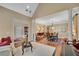 Open-concept living and dining area with hardwood floors and elegant decor at 350 Declaire Ne Way, Marietta, GA 30067