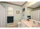 Bathroom featuring a toilet, single sink vanity, and tile flooring at 2261 Ravenwood Trl, Marietta, GA 30066