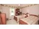Cozy bedroom featuring two twin beds, soft natural lighting, and matching furnishings at 2261 Ravenwood Trl, Marietta, GA 30066