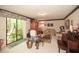 Carpeted living room with sitting area, furnishings, and sliding door to a deck at 2261 Ravenwood Trl, Marietta, GA 30066